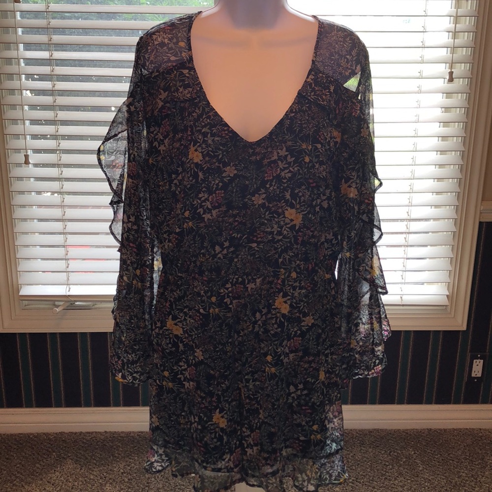 Sheer floral print long sleeve romper in black